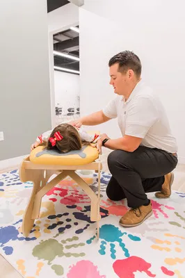 Chiropractor Springfield MO Tyler Alsup Adjusting Child